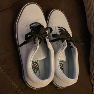 Baby blue vans with black soles